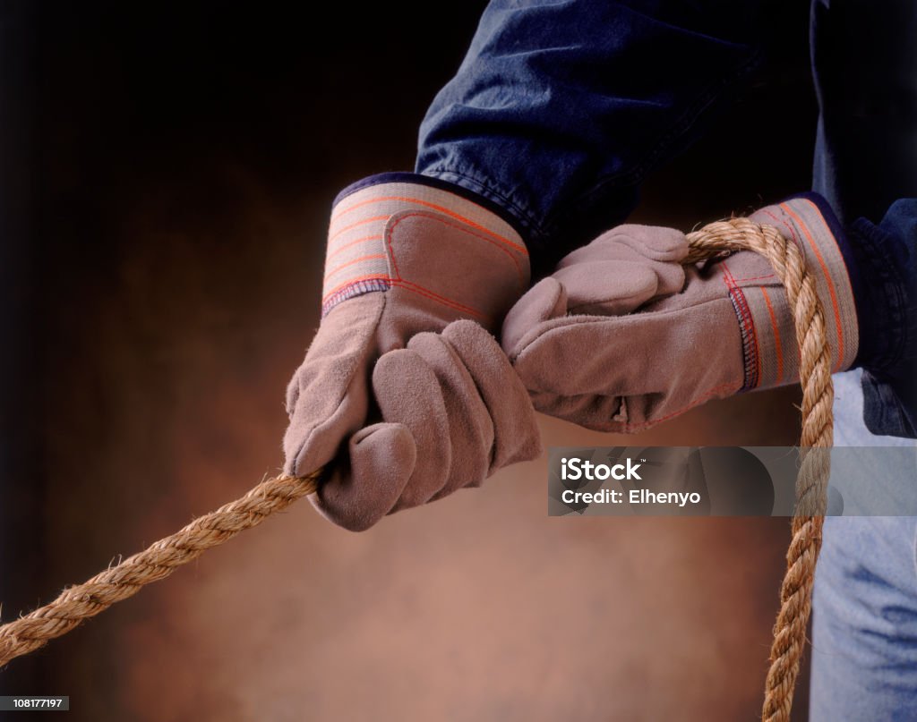ペアの引っ張りにロープのグローブ - 保護用手袋のロイヤリティフリーストックフォト