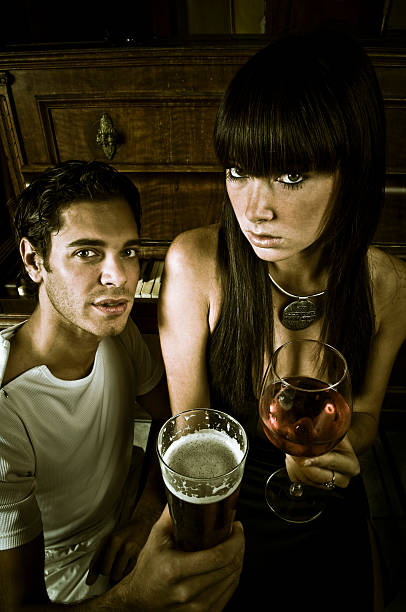istock Young Couple Drinking Beer and Wine 108177235