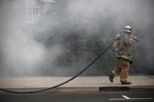 Firefighter Battling a Wildfire.