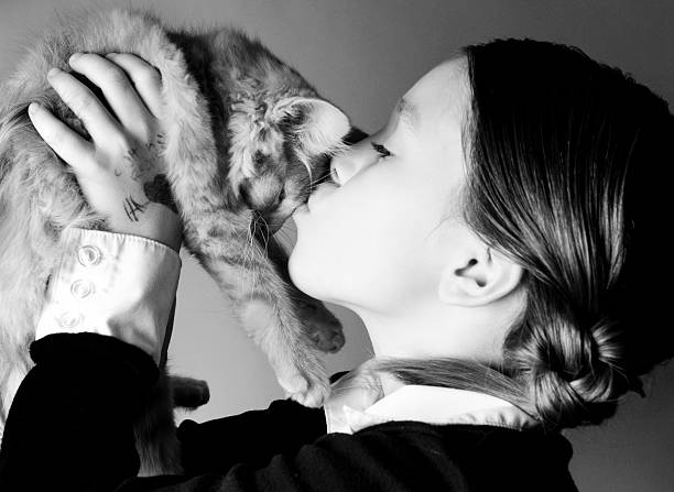 istock Litte Girl Holding Her Kitty 108177572