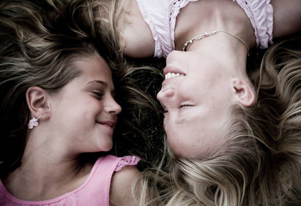 Two Best Friends Laying Down stock photo