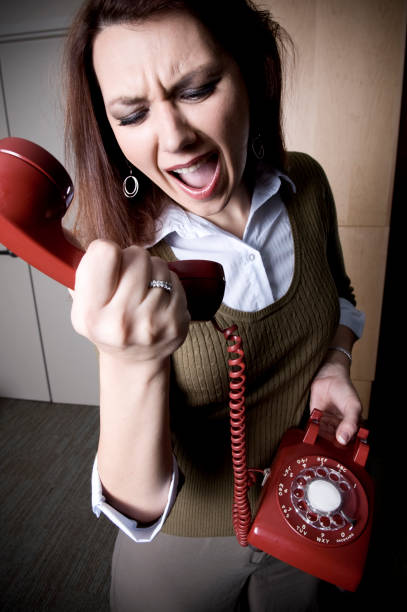 istock Woman Yelling Into PHone 108177715