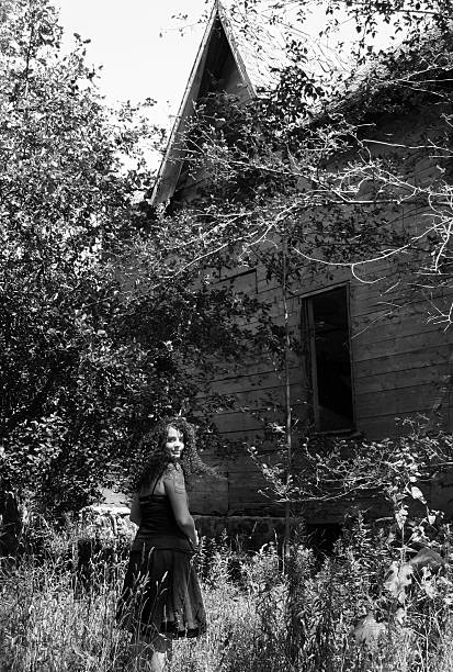 istock Abandoned House and Young Woman 108177766