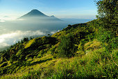 Mountain and volcano landscape in Indonesia at sunrise