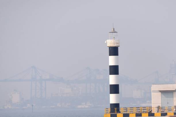 istock Tianjin Harbor Beacon in Smog 1081779598
