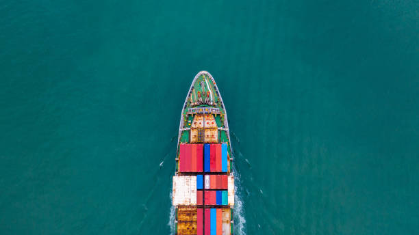istock Aerial view container ship carrying container for import and export, business logistic and freight transportation by ship in open sea. 1081783848