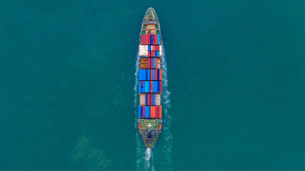 istock Aerial view container ship carrying container for import and export, business logistic and freight transportation by ship in open sea. 1081783856