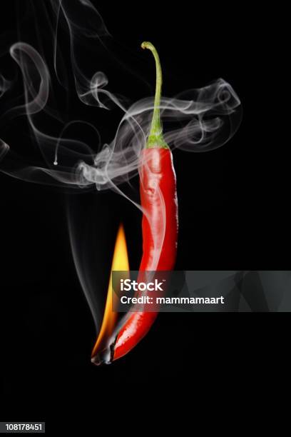 Burning Smoking Red Hot Chili Pepper Stock Photo - Download Image Now - Black Background, Black Color, Burning