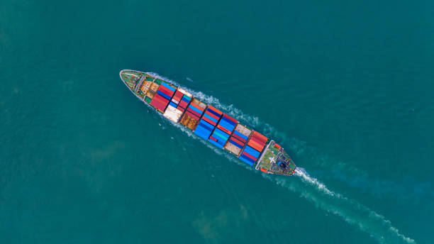 istock Aerial view container ship carrying container for import and export, business logistic and freight transportation by ship in open sea. 1081785044