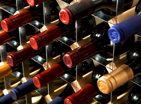 Bottles of a sparkling wine in a bucket with an ice close up