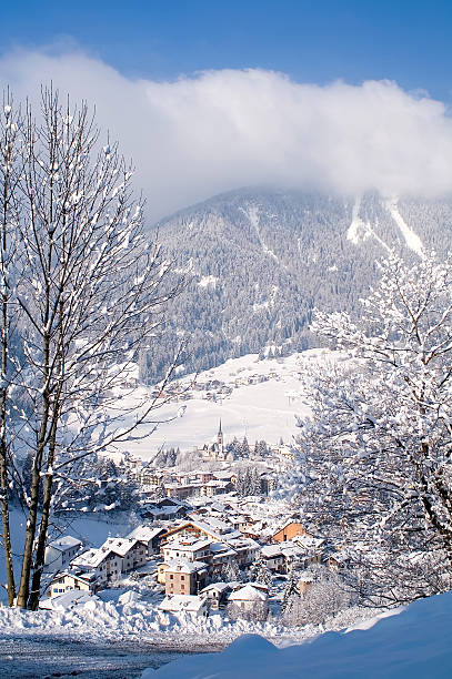istock European Alps Small Town Covered in Snow 108178693
