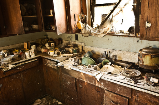 Shot of kitchen sink full of dirty dishes