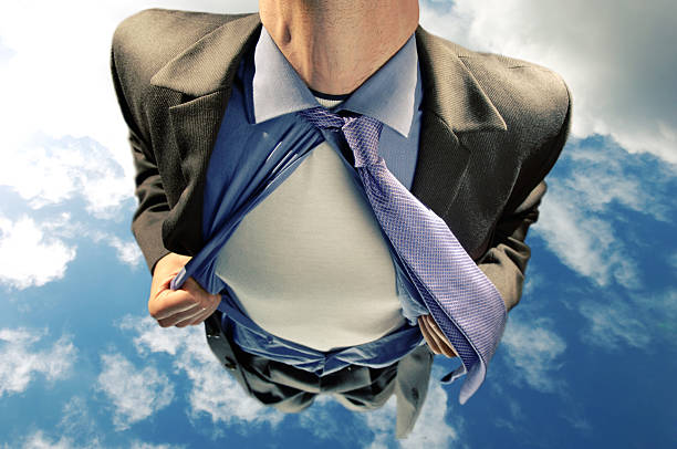 бизнесмен супергероя, летящий с небо / - chest fly стоковые фото и изображения