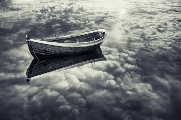 Photo of Dreamlike Boat Floating in Skylike Lake