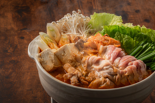 Kimchi-jjigae is a Korean dish, made with kimchi and other ingredients