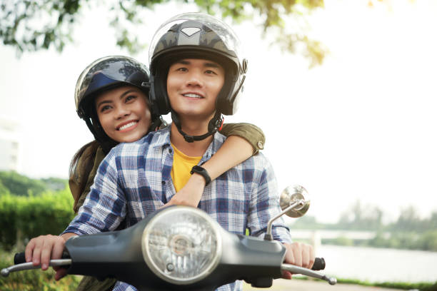 istock Young couple on bike 1081803968