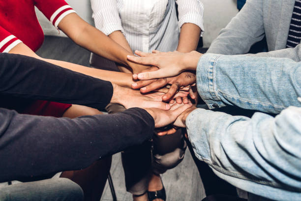 istock Successful of group business people stack and putting their hands together at office.Friendship teamwork concept 1081805152