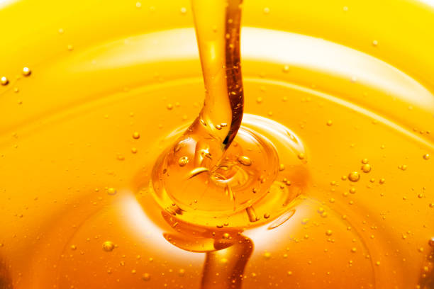 istock Close up of pouring Honey 1081805354