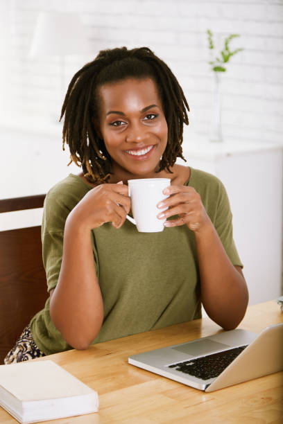 istock Pretty woman drinking coffee 1081805418