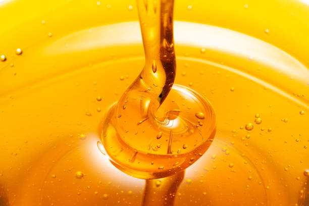 istock Close up of pouring Honey 1081805486