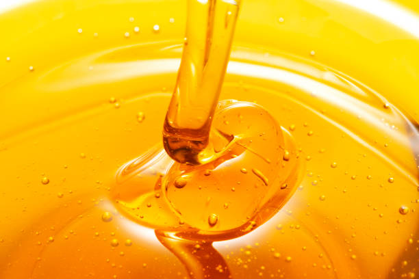 istock Close up of pouring Honey 1081805496