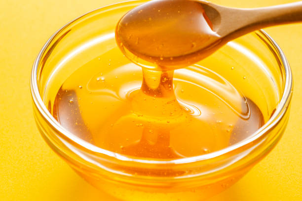 istock Close up of pouring Honey 1081805528