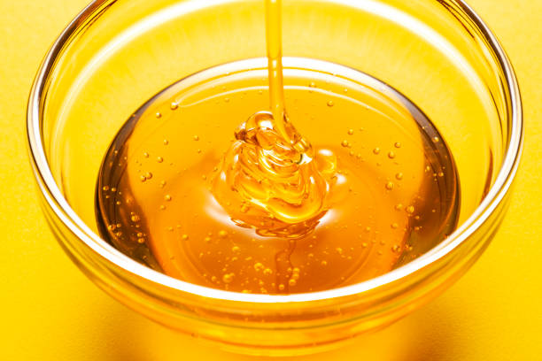 istock Close up of pouring Honey 1081805556