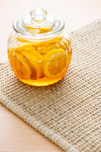 istock Honey lemon in a bottle 1081805726