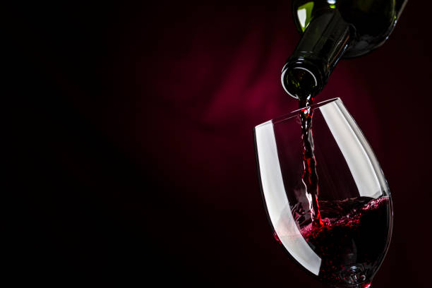 istock Pour wine in a glass 1081811628