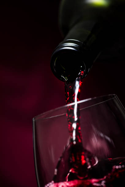 istock Pour wine in a glass 1081813748
