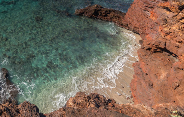 istock Close-up of Beach and Red Lava Cliffs on Lanai 1081816044