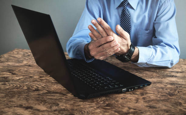 istock Work on the computer. Man suffering from wrist pain 1081825242