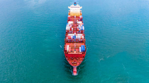 istock Aerial view container ship, Carrying container for import export business logistic and transportation of International by freight cargo ship in the open sea. 1081825276