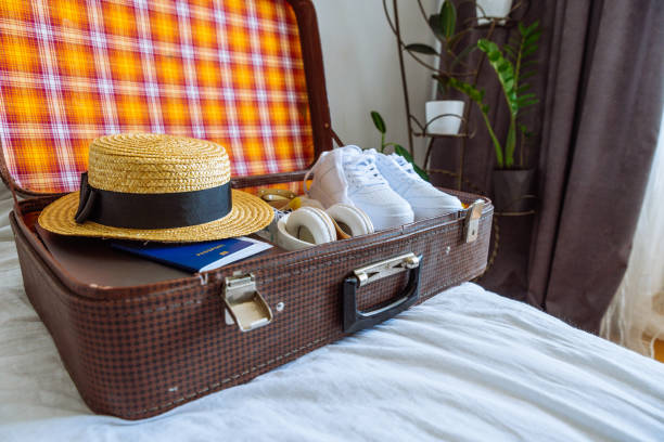 istock suitcase with clothes ready for trip. travel concept. copy space 1081841928