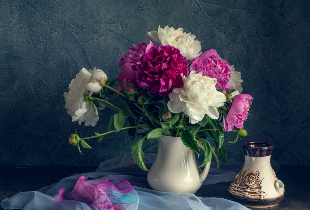 istock Still life with white and pink peonies. 1081851608