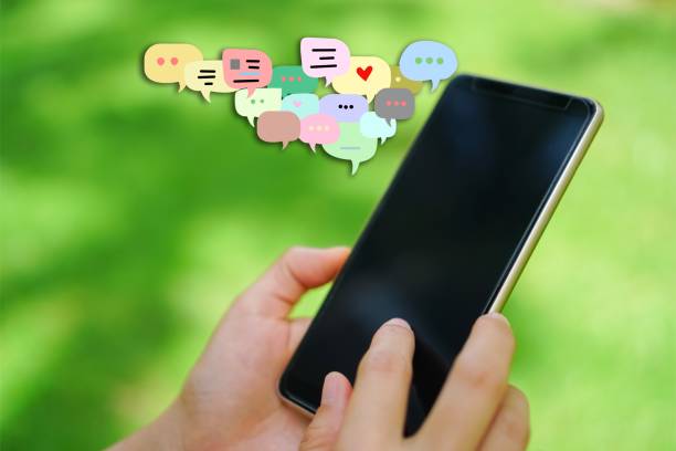 istock Woman hand using smartphone with chat icon background. Business communication social network concept. 1081854556