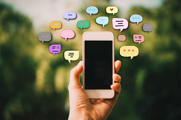 istock Woman hand using smartphone with chat icon background. Business communication social network concept. 1081854642