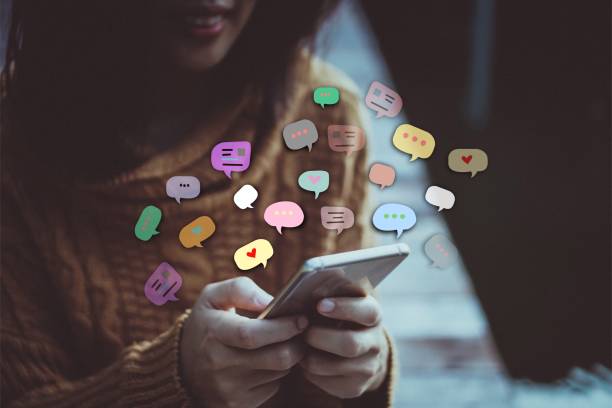 istock Woman hand using smartphone with chat icon background. Business communication social network concept. 1081854646
