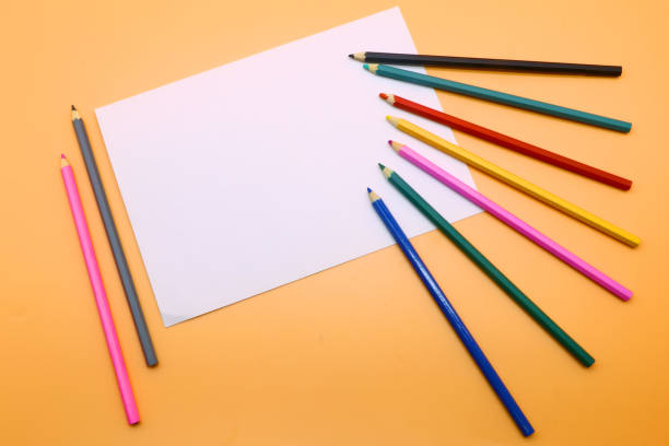 istock colored pencils and a clean sheet of paper 1081857012