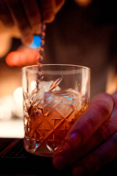 istock Barman is making cocktail at night club 1081860110