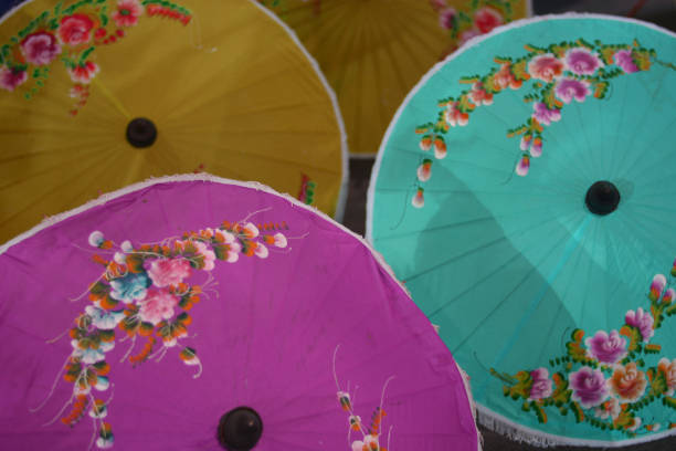 istock colored umbrellas of rice paper 1081860602