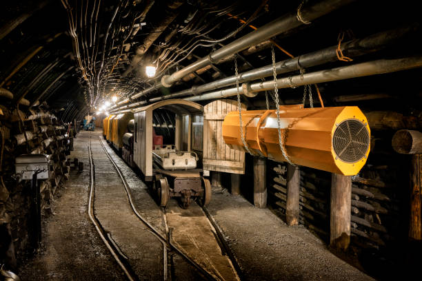 Hard coal mine underground corridor with steel support system and electrical equipment Hard coal mine underground corridor with steel support system and electrical equipment, Bochum, Germany train air conditioner stock pictures, royalty-free photos & images