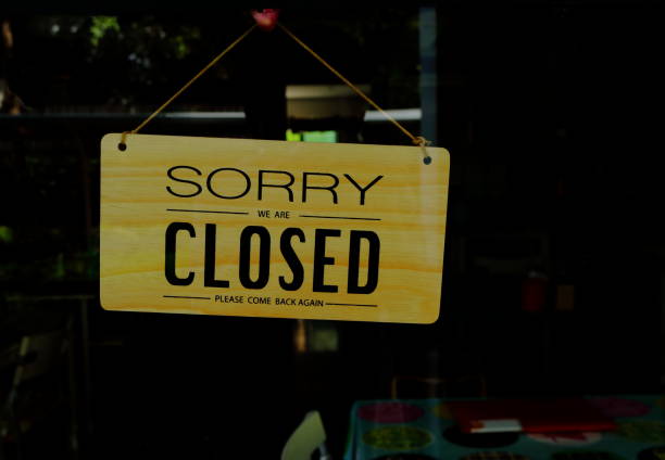 istock wooden closed sign 1081866048
