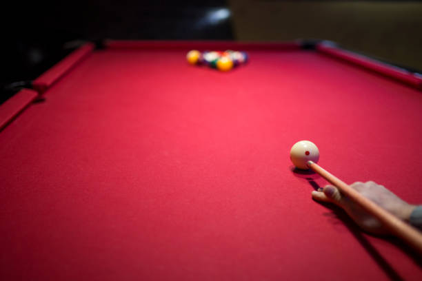 istock Preparing to break spheres into the pool pocket 1081866354