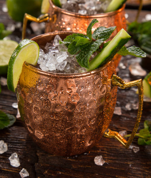 istock Famous Moscow mule alcoholic cocktail in copper mugs. 1081867234