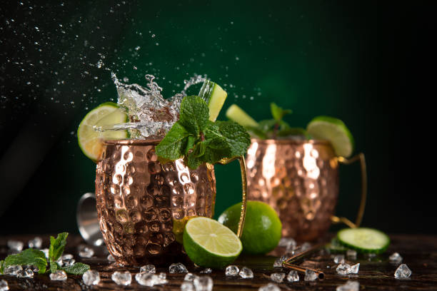istock Famous Moscow mule alcoholic cocktail in copper mugs. 1081867270