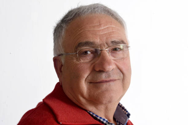 portrait of a senior man on white