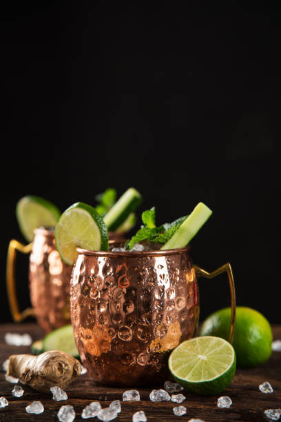 istock Famous Moscow mule alcoholic cocktail in copper mugs. 1081867376