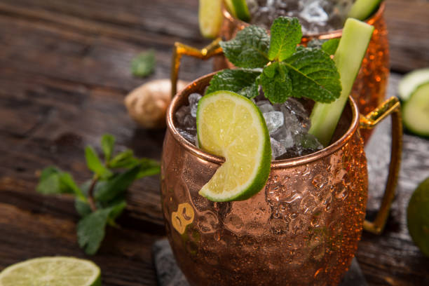 istock Famous Moscow mule alcoholic cocktail in copper mugs. 1081867486