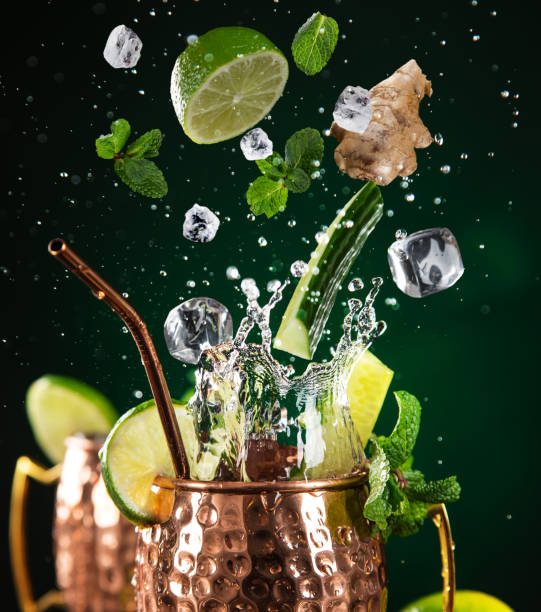 istock Famous splashing Moscow mule alcoholic cocktail in copper mugs. 1081867510